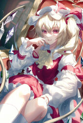 Rule 34 | 1girl, absurdres, adapted costume, ascot, blonde hair, bow, collared shirt, commentary request, crystal, fang, feet out of frame, flandre scarlet, frilled ascot, frilled bow, frilled shirt collar, frilled skirt, frilled sleeves, frilled vest, frills, hair between eyes, hat, hat bow, highres, juliet sleeves, kneehighs, long sleeves, looking at viewer, medium hair, mob cap, multicolored wings, on chair, open mouth, parted lips, puffy sleeves, red bow, red eyes, red skirt, red vest, shirt, side ponytail, sitting, skin fang, skirt, sleeve garter, socks, solo, toku kekakewanko, touhou, vest, white hat, white shirt, white socks, wings, yellow ascot