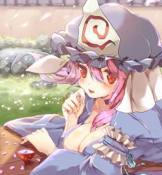 Rule 34 | 1girl, arm garter, bad id, bad twitter id, between breasts, blue dress, blue kimono, blush, breasts, cherry blossoms, choker, cleavage, collarbone, cup, dress, frills, grass, hand on own cheek, hand on own face, hat, highres, japanese clothes, kimono, large breasts, long sleeves, looking at viewer, lying, mob cap, on stomach, open mouth, petals, pink hair, red eyes, rock, saigyouji yuyuko, smile, solo, touhou, triangular headpiece, upper body, varyu, wall, wide sleeves, wind, wind lift