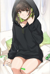 Rule 34 | 1girl, bandaid, bandaid on leg, black hoodie, blue nails, brown eyes, brown hair, closed mouth, cushion, earrings, highres, hood, hoodie, jewelry, looking at viewer, mole, mole on thigh, mole under eye, nail polish, nintendo switch, no pants, original, ormille, sitting, solo, thighs