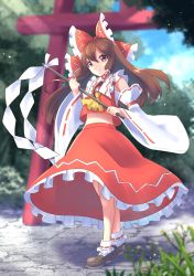 Rule 34 | 1girl, blue sky, bow, brown eyes, brown footwear, brown hair, detached sleeves, frills, full body, gohei, hair bow, hakurei reimu, highres, holding, japanese clothes, long hair, looking at viewer, marian oekaki, midriff, miko, navel, outdoors, red bow, red shirt, red skirt, shirt, skirt, sky, smile, socks, solo, standing, touhou, tree, white sleeves, white socks