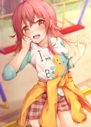 Rule 34 | 1girl, :o, absurdres, blurry, blurry background, blush, breasts, clothes around waist, collarbone, highres, idolmaster, idolmaster shiny colors, jacket, jacket around waist, komiya kaho, looking at viewer, outdoors, plaid, plaid shorts, playground, raglan sleeves, red eyes, red footwear, red hair, seven d3t, shorts, small breasts, solo, sweat, swing, teeth, upper teeth only, wiping sweat, wiping with clothes, yellow jacket