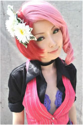 Rule 34 | 1girl, alisa boskonovich, cosplay, flower, green eyes, photo (medium), pink hair, solo, tekken