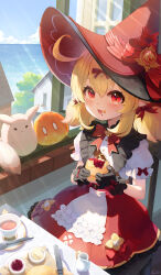 Rule 34 | 1girl, black gloves, blonde hair, blush, cup, food, food on face, genshin impact, gloves, hat, highres, holding, holding food, klee (blossoming starlight) (genshin impact), klee (genshin impact), looking at viewer, official alternate costume, pistachiocream, puffy short sleeves, puffy sleeves, red headwear, short sleeves, spoon, teacup, witch hat