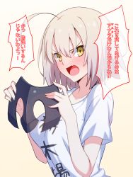 Rule 34 | 1girl, ahoge, blonde hair, blush, fang, fate/grand order, fate (series), hair between eyes, headpiece, headpiece removed, highres, jeanne d&#039;arc (fate), jeanne d&#039;arc alter (avenger) (fate), jeanne d&#039;arc alter (fate), looking at viewer, shirt, skylader, solo, t-shirt, translation request, tsundere, white shirt, yellow eyes