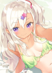 Rule 34 | 1girl, archerfish (azur lane), arm support, azur lane, beach, bikini, blush, breasts, cleavage, closed mouth, day, green bikini, hair between eyes, hair ornament, highres, kani biimu, long hair, looking at viewer, navel, ocean, one-piece tan, one side up, outdoors, outstretched arm, purple eyes, reaching, reaching towards viewer, sand, silver hair, small breasts, smile, solo, star (symbol), star hair ornament, swimsuit, tan, tanline, water, wavy hair