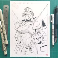 Rule 34 | 2girls, anode (transformers), breasts, goggles, goggles on head, helmet, highres, humanoid robot, lug (transformers), marker (medium), mechanical wings, medium breasts, multiple girls, photo (medium), robot, robot girl, the transformers (idw), traditional media, transformers, wings, winston chan