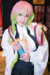 Rule 34 | 1girl, braid, breasts, cleavage, clothes, cosplay, female focus, gradient hair, highres, holding, holding sword, holding weapon, japanese (nationality), kanroji mitsuri, kanroji mitsuri (cosplay), kimetsu no yaiba, large breasts, looking at viewer, model, multicolored hair, open mouth, photo (medium), real life, shibuya kaho, smile, solo, sword, tongue, tongue out, twin braids, twintails, weapon