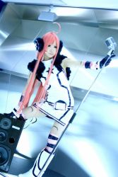 Rule 34 | 1girl, ahoge, boots, cosplay, cosplay photo, cuffs, dress, dutch angle, earphones, gloves, kneehighs, long hair, microphone, microphone stand, pantyhose, photo (medium), red hair, see-through, see-through legwear, sf-a2 miki, socks, solo, speaker, star (symbol), striped clothes, striped socks, striped thighhighs, thighhighs, vintage microphone, vocaloid