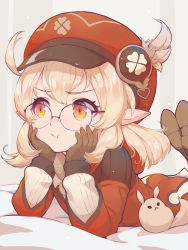 Rule 34 | 1girl, :t, ahoge, arm support, ass, bad id, bad pixiv id, bed sheet, bespectacled, blurry, brown footwear, brown gloves, brown scarf, cabbie hat, clover print, coat, commentary request, depth of field, dodoco (genshin impact), genshin impact, glasses, gloves, hair between eyes, hat, hat feather, hat ornament, highres, klee (genshin impact), legs up, light brown hair, long hair, long sleeves, looking away, low twintails, lying, on stomach, orange eyes, pointy ears, pout, red coat, red hat, scarf, sidelocks, solo, stuffed animal, stuffed toy, twintails, v-shaped eyebrows, yako noir (kei-ne)