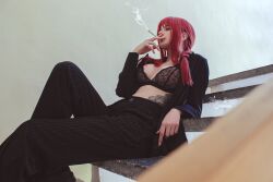 Rule 34 | 1girl, alternate costume, black bra, bra, breasts, chainsaw man, cigarette, cosplay, fingernails, highres, large breasts, makima (chainsaw man), pants, photo (medium), real life, red hair, sharp fingernails, sitting, smoke, smoking, solo, tanya bayer, tattoo on belly, underwear, wall, yellow eyes