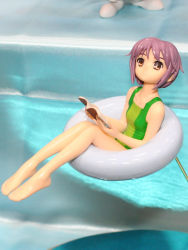 Rule 34 | 00s, 1girl, barefoot, book, breasts, brown eyes, casual one-piece swimsuit, closed mouth, feet, figure, green one-piece swimsuit, holding, innertube, looking at viewer, looking to the side, looking up, medium breasts, nagato yuki, one-piece swimsuit, open book, parted lips, photo (medium), purple hair, short hair, sidelocks, sitting, solo, suzumiya haruhi no yuuutsu, swim ring, swimsuit, water, wonder festival, wonder festival 2007