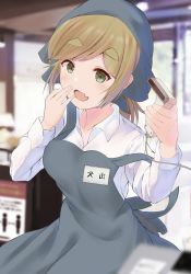Rule 34 | 1girl, apron, barcode scanner, blonde hair, blurry, blurry background, commentary, fang, file112056, green eyes, head scarf, highres, holding, indoors, inuyama aoi, name tag, ponytail, skin fang, solo, store clerk, strap slip, thick eyebrows, yurucamp