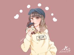 Rule 34 | 1girl, aida rikako, baseball cap, blue hat, blush, brown background, brown eyes, brown hair, character name, collarbone, commentary request, hand in pocket, hat, highres, hood, hood down, hoodie, kashikaze, long sleeves, looking at viewer, medium hair, parted lips, real life, signature, simple background, solo, translated, upper body, voice actor, white hoodie