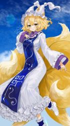 Rule 34 | 1girl, blue sky, blush, breasts, brooch, cloud, cloudy sky, dress, fox tail, frilled dress, frills, full body, gotou (nekocat), hand on own chest, hat, jewelry, kitsune, large breasts, long sleeves, looking at viewer, mob cap, multiple tails, ofuda, shoes, short hair, signature, sky, smile, solo, tabard, tail, tassel, touhou, white footwear, white sleeves, wide sleeves, yakumo ran, yellow eyes