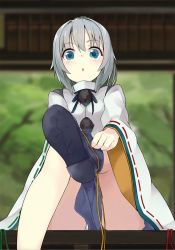 Rule 34 | 1girl, blue eyes, blush, boots, character name, convenient censoring, gradient background, grey hair, highres, japanese clothes, leg up, long hair, long sleeves, looking at viewer, looking down, monobe tsukuri, mononobe no futo, no headwear, open mouth, pom pom (clothes), ponytail, putting on shoes, sitting, skirt, solo, touhou, turtleneck, wide sleeves