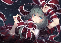 Rule 34 | 1girl, aqua eyes, arm up, black dress, black nails, breasts, commentary request, dress, frilled ribbon, frills, front ponytail, green hair, hand up, kagiyama hina, large breasts, lens flare, long hair, looking at viewer, nail polish, parted lips, partially submerged, puffy short sleeves, puffy sleeves, red nails, red ribbon, ribbon, short sleeves, smile, solo, sparkle, touhou, toutenkou, upper body, water, wrist ribbon