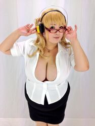 Rule 34 | 1girl, asian, blonde hair, breasts, brown eyes, cosplay, fat, glasses, headphones, hoshima mika, huge breasts, jewelry, necklace, nitroplus, photo (medium), plump, solo, star (symbol), super pochaco, super pochaco (cosplay)