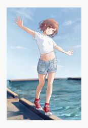 Rule 34 | 1girl, absurdres, balancing, bare legs, blue sky, border, brown eyes, brown hair, commentary, converse, cross-laced footwear, determined, full body, fuyutsuki11, hair intakes, high tops, highres, light blue shorts, looking at viewer, navel, ocean, outstretched arms, project sekai, red footwear, shinonome ena, shirt, shoes, short hair, sidelocks, sky, smile, smug, sneakers, solo, t-shirt, walking, waves, white border, white shirt