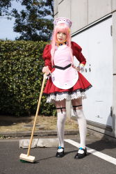 Rule 34 | 1girl, apron, asian, black footwear, blurry, breasts, broom, contrapposto, cosplay, depth of field, dress, garter straps, hand on own hip, hedge, highres, looking at viewer, maid, maid apron, makeup, mary janes, mascara, namada, nono (top wo nerae 2!), outdoors, parking lot, parted lips, photo (medium), pigeon-toed, pink hair, puffy sleeves, shoes, short dress, sidelocks, small breasts, solo, standing, thighhighs, top wo nerae 2!, tree, white thighhighs, zettai ryouiki