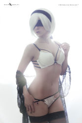 Rule 34 | 1girl, absurdres, adapted costume, android, arms up, artist name, black hairband, black panties, black thighhighs, blurry, bob cut, bra, breasts, cosplay, dutch angle, gloves, hairband, highleg, highres, holding, lingerie, medium breasts, nier (series), nier:automata, panties, parted lips, photo (medium), short hair, silver hair, solo, thighhighs, underwear, watermark, web address, white panties, white theme, 2b (nier:automata)