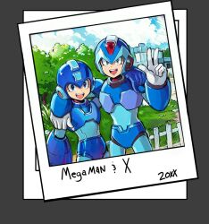 Rule 34 | 2boys, armor, blue armor, blue eyes, blue helmet, bush, commentary, dauntedx, english commentary, fence, forehead jewel, grass, helmet, in-franchise crossover, looking at viewer, male focus, mega man (character), mega man (classic), mega man (series), mega man day, mega man x (series), multiple boys, outdoors, photo (object), w, x (mega man)