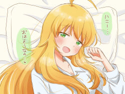 Rule 34 | 1girl, ahoge, bed sheet, blonde hair, blue shirt, blush, breasts, cleavage, collarbone, from above, green eyes, highres, hoshii miki, idolmaster, idolmaster (classic), idolmaster million live!, idolmaster million live! theater days, long hair, long sleeves, looking at viewer, lying, medium breasts, morning, on back, on bed, open mouth, pillow, shirt, smile, solo, speech bubble, suruga tou, translated, upper body