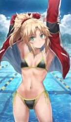 Rule 34 | 1girl, alternate costume, bikini, blonde hair, braid, breasts, commentary, fate/grand order, fate (series), french braid, green eyes, hair ornament, hair scrunchie, highres, jacket, lane line, long hair, looking at viewer, mordred (fate), mordred (fate/apocrypha), navel, one-piece swimsuit, paid reward available, parted bangs, ponytail, pool, red scrunchie, scrunchie, sidelocks, small breasts, smile, solo, swimsuit, thighs, tonee