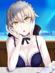 Rule 34 | 1girl, arm support, artoria pendragon (alter swimsuit rider) (fate), artoria pendragon (alter swimsuit rider) (second ascension) (fate), artoria pendragon (fate), bare shoulders, bikini, black bow, blue bikini, blue sky, blush, bow, braid, breasts, caruta, cleavage, collarbone, commentary request, cup, day, drinking glass, fate/grand order, fate (series), fingernails, frilled bikini, frills, hair between eyes, head tilt, highres, horizon, light brown hair, looking at viewer, medium breasts, ocean, outdoors, parted lips, sidelocks, sky, solo, spill, swimsuit, water, wine glass, yellow eyes