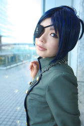 Rule 34 | 1girl, asian, blue hair, breasts, chrome dokuro, color contacts, cosplay, eyepatch, female focus, highres, indoors, jewelry, katekyo hitman reborn!, looking at viewer, looking to the side, makeup, mascara, namada, necklace, parted lips, photo (medium), short hair, skull and crossbones, small breasts, solo, standing, uniform, window