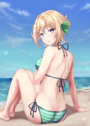 Rule 34 | 1girl, bare arms, bare legs, bare shoulders, barefoot, beach, bikini, blonde hair, blush, braid, closed mouth, day, green bikini, hair between eyes, hair ornament, hairclip, highres, kantai collection, light smile, looking at viewer, looking back, monoku, ocean, perth (kancolle), purple eyes, sand, short hair, solo, sparkle, striped bikini, striped clothes, swimsuit