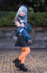 Rule 34 | 1girl, absurdres, artist request, bare shoulders, blue eyes, blue hair, boots, cosplay, flat chest, floor, hat, highres, hololive, hoshimachi suisei, hoshimachi suisei (cosplay), jacket, lips, long hair, looking at viewer, orange pantyhose, pantyhose, photo (medium), real life, skirt, smile, virtual youtuber