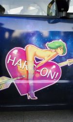 Rule 34 | 00s, arrow (projectile), ass, bent over, breasts, car, green hair, heart, high heels, itasha, macross, macross frontier, motor vehicle, nude, official art, photo (medium), ranka lee, sexually suggestive, shoes, solo, sticker, thighhighs, valentine, vehicle