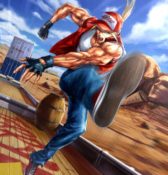 Rule 34 | 1boy, barrel, baseball cap, blonde hair, blue eyes, blue sky, cloud, commentary request, container, converse, day, denim, desert, dutch angle, fatal fury, fingerless gloves, gloves, hat, highres, jacket, jeans, kicking, l.g (greenforce1), long hair, looking at viewer, male focus, mount rushmore, mountainous horizon, muscular, open mouth, outdoors, pants, ponytail, shirt, shoes, sky, sneakers, snk, solo, tank top, terry bogard, the king of fighters, train, vest, white shirt, wooden floor