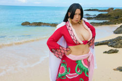 Rule 34 | 1girl, amazon warrior, asian, black hair, blue eyes, boa hancock, boa hancock (cosplay), breasts, chouzuki maryou, cleavage, cosplay, curvy, earrings, female focus, hip focus, jewelry, large breasts, ocean, one piece, outdoors, photo (medium), plump, thick thighs, thighs, wide hips