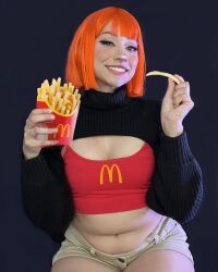 Rule 34 | 1girl, black background, breasts, brown eyes, cleavage, cosplay, female focus, food, french fries, highres, looking at viewer, mcdonald&#039;s, mexican (nationality), mother (yoru mac), mother (yoru mac) (cosplay), navel, orange hair, photo (medium), short hair, simple background, sitting, small breasts, smile, solo, taliverse, teeth