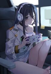 1girl absurdres ayuyaki bags_under_eyes bandaid bandaid_on_knee bandaid_on_leg barefoot black_choker black_hair black_nails chair choker exia_(nikke) foot_out_of_frame game_controller_print goddess_of_victory:_nikke hair_between_eyes handheld_game_console headphones headset highres holding holding_handheld_game_console jacket legs long_hair looking_at_viewer monitor nail_polish off_shoulder office_chair open_clothes open_jacket playing_games purple_eyes screen_light shirt sidelocks sitting solo swivel_chair thighs white_jacket white_shirt