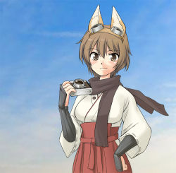 Rule 34 | 1girl, animal ears, blush, brown eyes, brown hair, camera, dog ears, goggles, goggles on head, japanese clothes, katou keiko, miritsu, mirutsu (milts), scarf, short hair, smile, solo, strike witches, witches of africa, world witches series