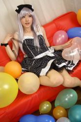 Rule 34 | balloon, bow, cosplay, couch, dress, hair bow, photo (medium), polka dot, polka dot dress, red upholstery, ribbon, saya (cosplayer), silver hair, sitting