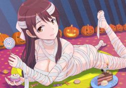 Rule 34 | 1girl, ass, bandages, blush, brave witches, breasts, brown eyes, brown hair, butt crack, cake, candy, cleavage, closed mouth, collarbone, cookie, food, halloween, jack-o&#039;-lantern, karibuchi takami, keicha (kmoekaki), large breasts, lollipop, long hair, lying, mummy costume, on stomach, shiny skin, solo, tongue, tongue out, world witches series