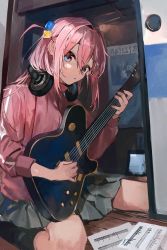 Rule 34 | 1girl, akg k-series headphones, black socks, blue eyes, bocchi the rock!, commentary request, cube hair ornament, electric guitar, gibson les paul, gotoh hitori, grey skirt, guitar, hair between eyes, hair ornament, headphones, headphones around neck, highres, holding, holding instrument, indoors, instrument, jacket, long bangs, long hair, long sleeves, looking at viewer, muntai, music, one side up, parted lips, pink hair, pink jacket, playing instrument, pleated skirt, sheet music, sitting, skirt, socks, solo, track jacket, wariza
