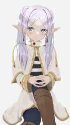 Rule 34 | 1girl, capelet, frieren, green eyes, grey hair, highres, johnnyyyyy, looking at viewer, simple background, sitting, smile, solo, sousou no frieren, twintails