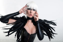 Rule 34 | 1girl, batman (series), black nails, blue eyes, constantine in tokyo, corset, cosplay, dc comics, detached sleeves, feathered cape, feathers, magpie, makeup, margaret sorrow, nail polish, photo (medium), solo, white hair