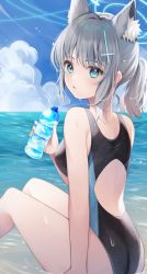 Rule 34 | absurdres, animal ear fluff, animal ears, arm support, back, blue archive, blue sky, bottle, breasts, cloud, cloudy sky, competition swimsuit, cross hair ornament, hair ornament, halo, highres, ichinose (sorario), looking at viewer, looking to the side, mismatched pupils, ocean, one-piece swimsuit, partially submerged, shiroko (blue archive), shiroko (swimsuit) (blue archive), sitting, sky, swimsuit, water