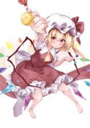 Rule 34 | 1girl, absurdres, arm up, ascot, barefoot, between fingers, blonde hair, blush, candy, crystal, dual wielding, flandre scarlet, food, foreshortening, frills, from above, full body, grey background, hair between eyes, hat, hat ribbon, highres, holding, holding food, lollipop, looking at viewer, mob cap, mouth hold, one side up, outstretched arm, puffy short sleeves, puffy sleeves, r utchi, red eyes, red ribbon, red skirt, red vest, ribbon, shirt, short sleeves, sitting, skirt, skirt set, solo, toes, touhou, vest, wings