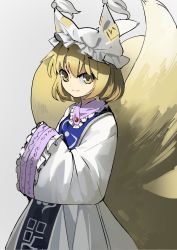 Rule 34 | 1girl, animal hat, blonde hair, blue tabard, commentary, dress, fox girl, fox tail, frilled shirt collar, frilled sleeves, frills, grey background, hat, highres, kitsune, kyuubi, long sleeves, looking at viewer, mob cap, multiple tails, own hands together, short hair, sideways glance, sleeves past fingers, sleeves past wrists, smile, suna (s73d), tabard, tail, tassel, touhou, white dress, wide sleeves, yakumo ran, yellow eyes