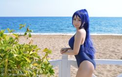 Rule 34 | 10s, 1girl, beach, blue hair, cloud, cosplay, cosplay photo, day, female focus, highres, long hair, looking at viewer, love live!, love live! sunshine!!, matsuura kanan, matsuura kanan (cosplay), ocean, one-piece swimsuit, outdoors, photo (medium), plant, ponytail, purple eyes, sky, solo, swimsuit, water, yoshinobi cos
