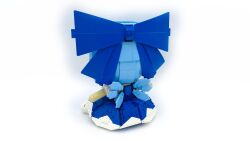 Rule 34 | 1girl, blue bow, blue dress, blue hair, bow, cirno, commentary, dress, english commentary, facing away, fairy wings, from behind, full body, fumo (doll), hair bow, highres, lavishlump, lego (medium), light blue hair, medium hair, short sleeves, simple background, sitting, solo, touhou, unconventional media, white background, wings