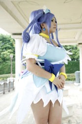 Rule 34 | 1girl, ankle boots, asian, blue eyes, blue hair, boots, bow, bracelet, breasts, choker, chouzuki maryou, cosplay, cure diamond, cure diamond (cosplay), dokidoki! precure, dress, headpiece, highres, jewelry, large breasts, long hair, magical girl, matching hair/eyes, photo (medium), plump, ponytail, precure, puffy short sleeves, puffy sleeves, ribbon, short sleeves, solo, tiara