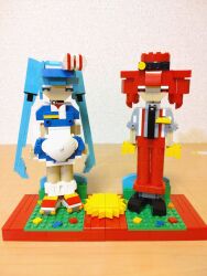 Rule 34 | 2girls, alternate costume, apron, arms at sides, black footwear, black necktie, blue dress, blue eyes, blue hair, bow, choroli (chorolin), commentary, dress, drill hair, full body, gloves, grey shirt, hair bow, hat, hatsune miku, highres, kasane teto, lego (medium), long hair, looking at viewer, mesmerizer (vocaloid), multiple girls, necktie, pants, red eyes, red footwear, red hair, red hat, red pants, roller skates, shirt, shoes, short dress, short sleeves, skates, sleeves rolled up, socks, standing, striped bow, suspenders, twin drills, twintails, unconventional media, utau, very long hair, vocaloid, white apron, white socks, yellow gloves