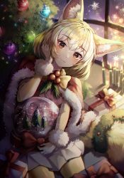 Rule 34 | 1girl, absurdres, animal ear fluff, animal ears, blonde hair, blush, brown eyes, candle, capelet, christmas, christmas tree, closed mouth, commentary request, feet out of frame, fennec (kemono friends), fox ears, fur trim, gift, hair between eyes, hand in own hair, head tilt, highres, kemono friends, light smile, looking at viewer, mirage (rairudiseu), red capelet, short hair, sitting, snow globe, snowflakes, solo, window, wreath